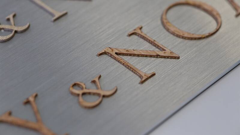 Cork lettering on silver background