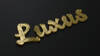 Letratec - Schriftzug Luxus  in gold mit scharfen Kanten 